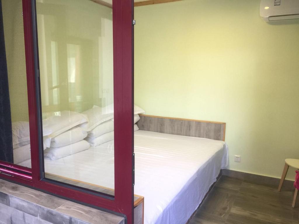 Postel nebo postele na pokoji v ubytování Chez Ina & Jasee