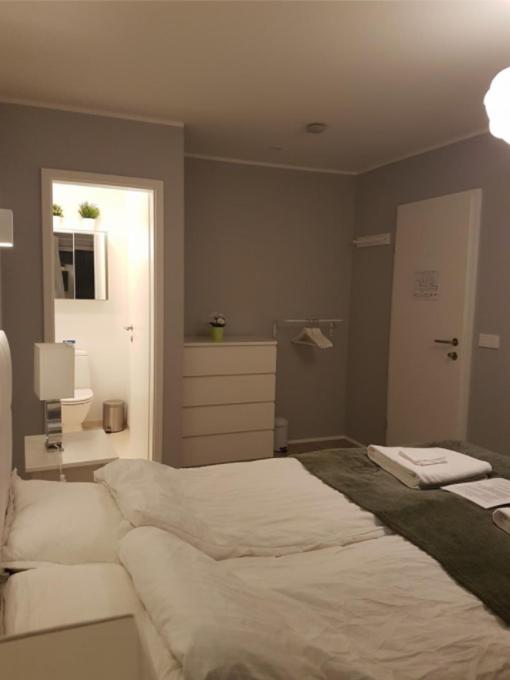 Postel nebo postele na pokoji v ubytování Ubak Guesthouse