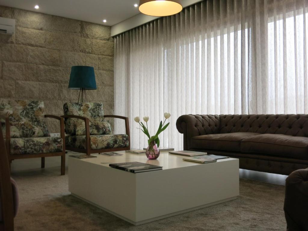 Uma área de estar em Hotel Rural da Freita