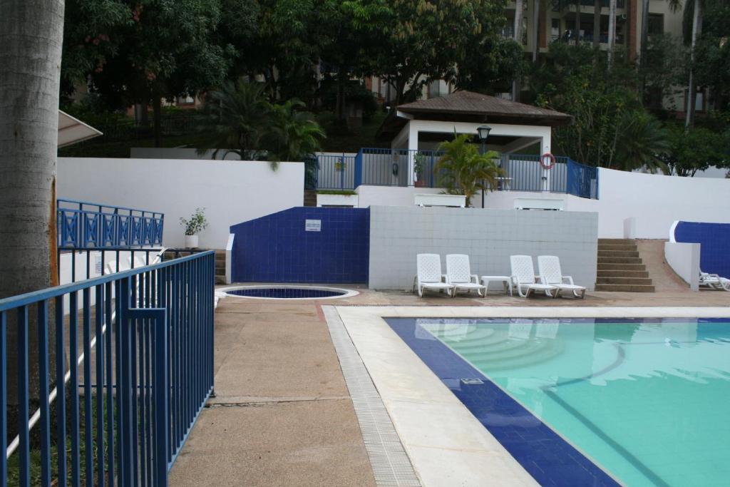 Bazén v ubytování girardot resort apto102 nebo v jeho okolí