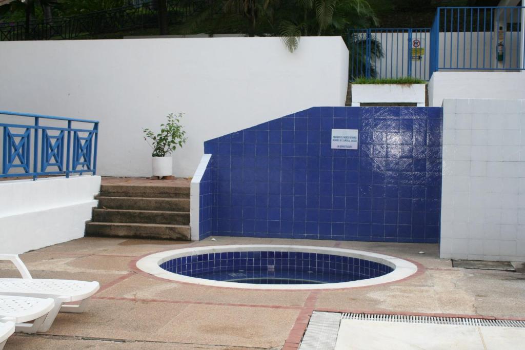 Bazén v ubytování girardot resort apto102 nebo v jeho okolí
