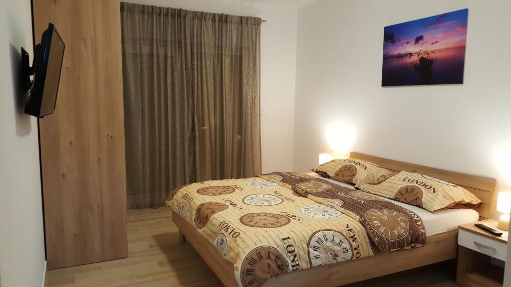 Postel nebo postele na pokoji v ubytování Villa Martina