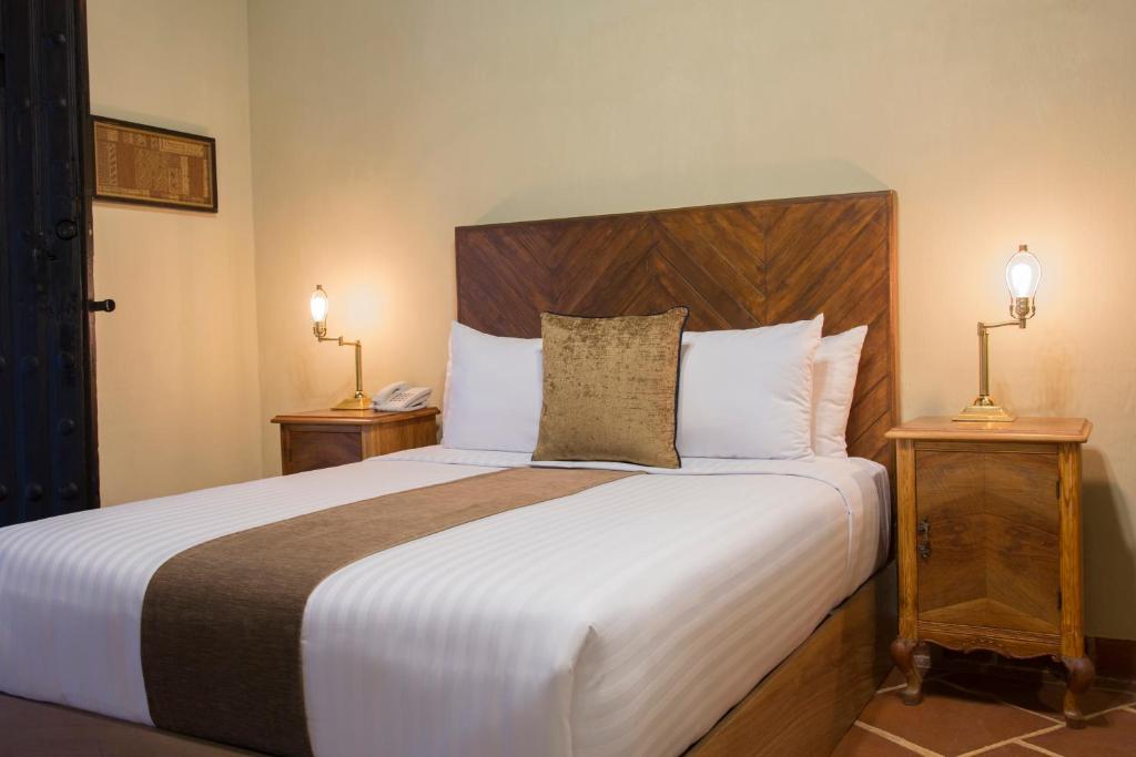 Cama ou camas em um quarto em Casa Maria Paz Hotel Boutique