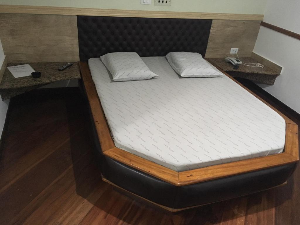 Posteľ alebo postele v izbe v ubytovaní Hotel City Sacomã