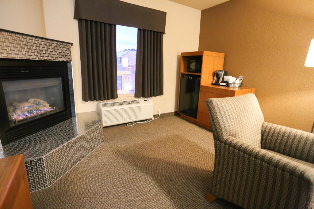 Posezení v ubytování Days Inn by Wyndham Calgary Airport