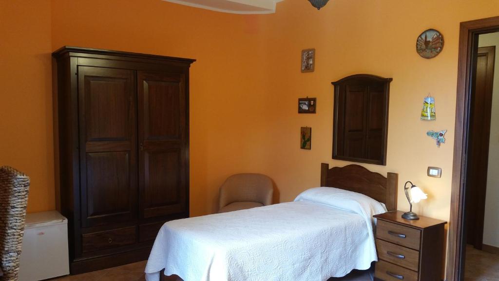 Postel nebo postele na pokoji v ubytování B&B A Robba de Pupi