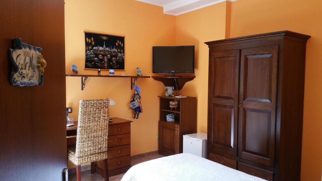 TV a/nebo společenská místnost v ubytování B&B A Robba de Pupi