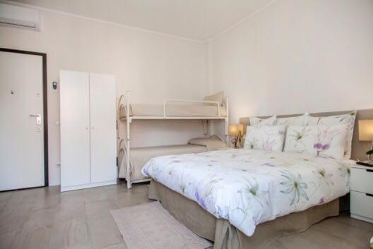 Postel nebo postele na pokoji v ubytování Cristel Apartment - 15 min da Milano