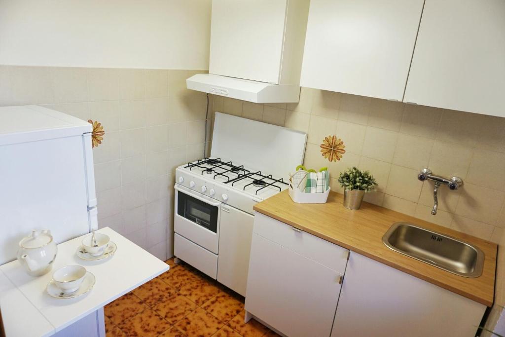 Kuchyňa alebo kuchynka v ubytovaní Casa Dante