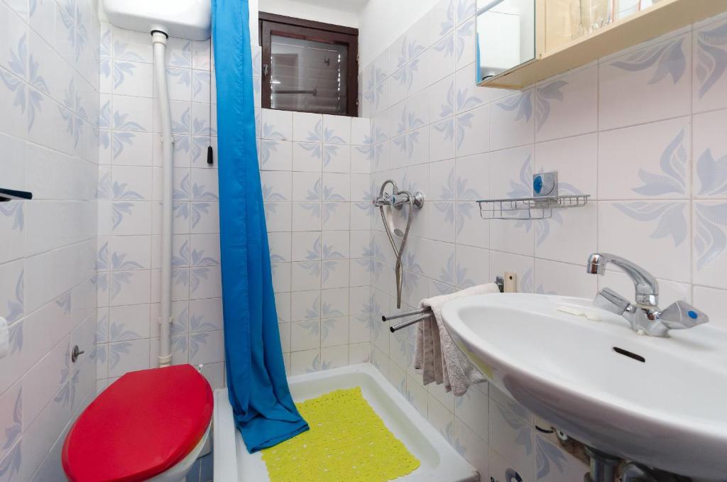 Kúpeľňa v ubytovaní Apartments and Room Luka