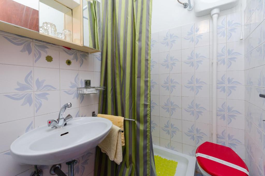 Kúpeľňa v ubytovaní Apartments and Room Luka