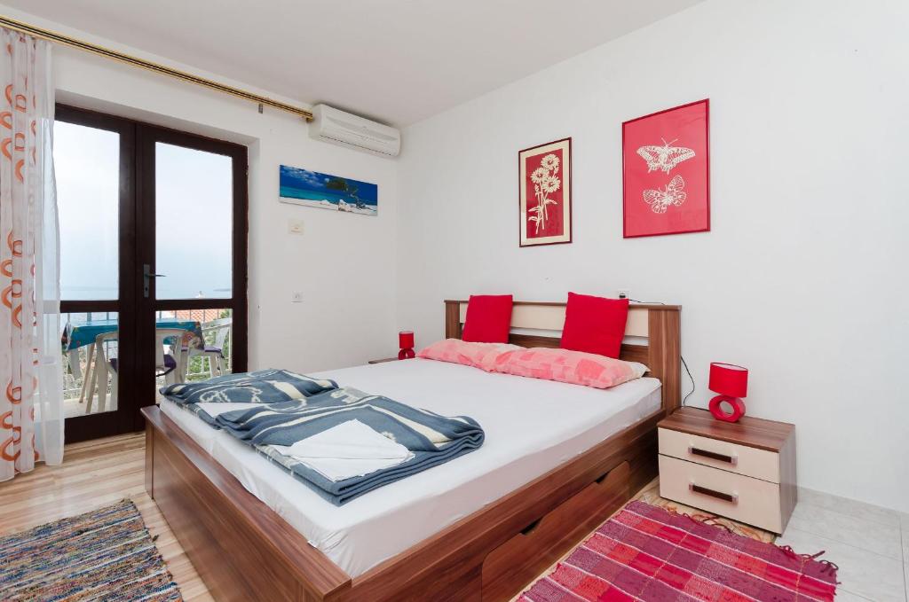 Posteľ alebo postele v izbe v ubytovaní Apartments and Room Luka