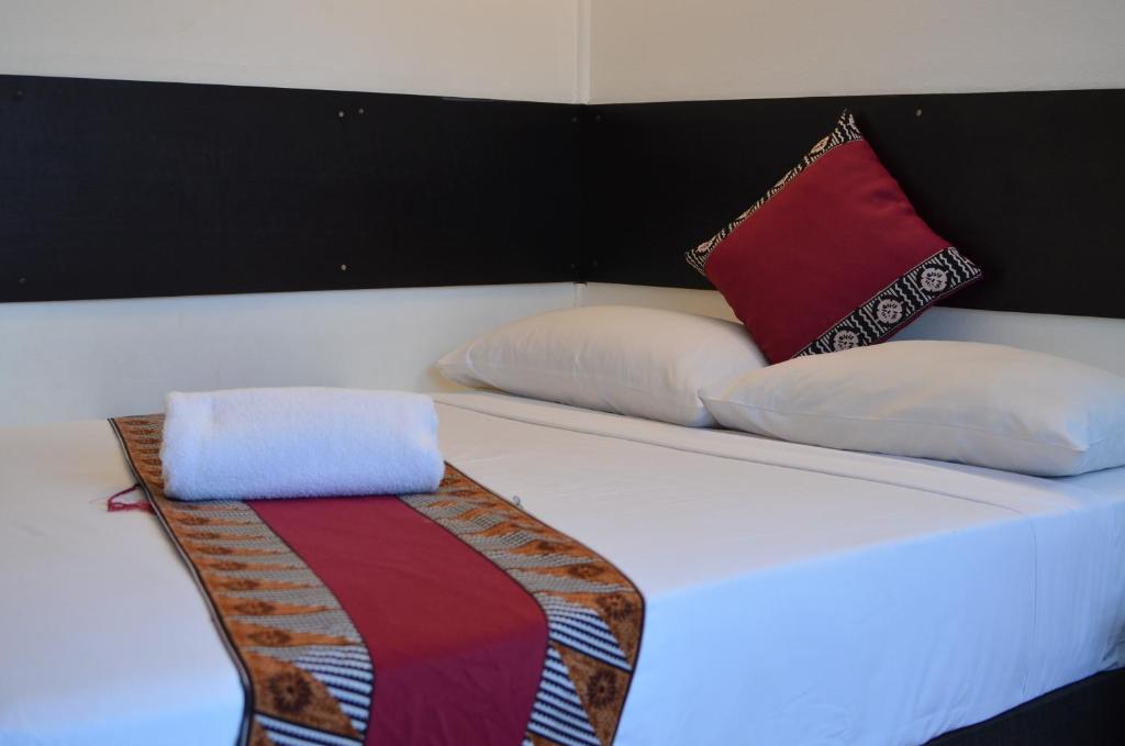Postel nebo postele na pokoji v ubytování Grand West Villas