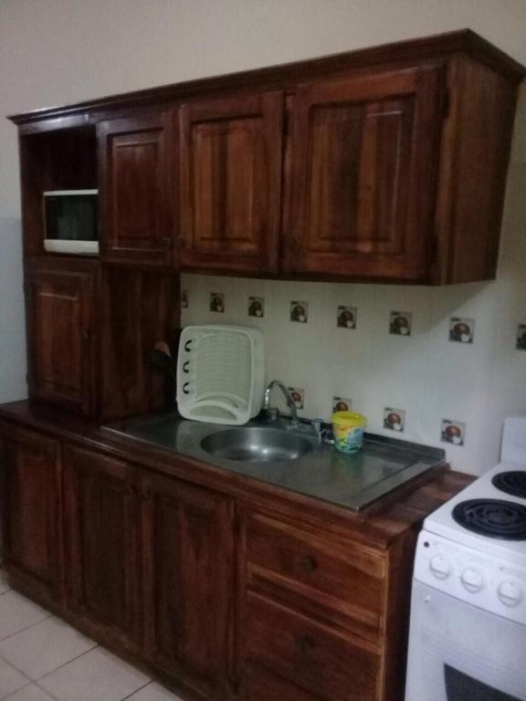 Kuchyň nebo kuchyňský kout v ubytování Apartamentos del Puerto