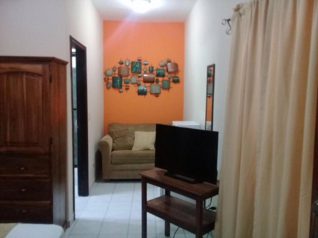 TV a/nebo společenská místnost v ubytování Apartamentos del Puerto