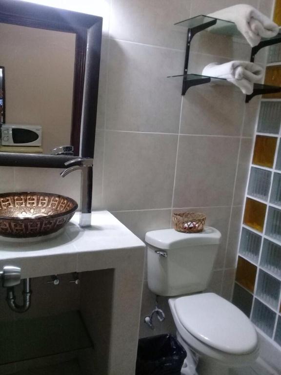 Koupelna v ubytování Apartamentos del Puerto