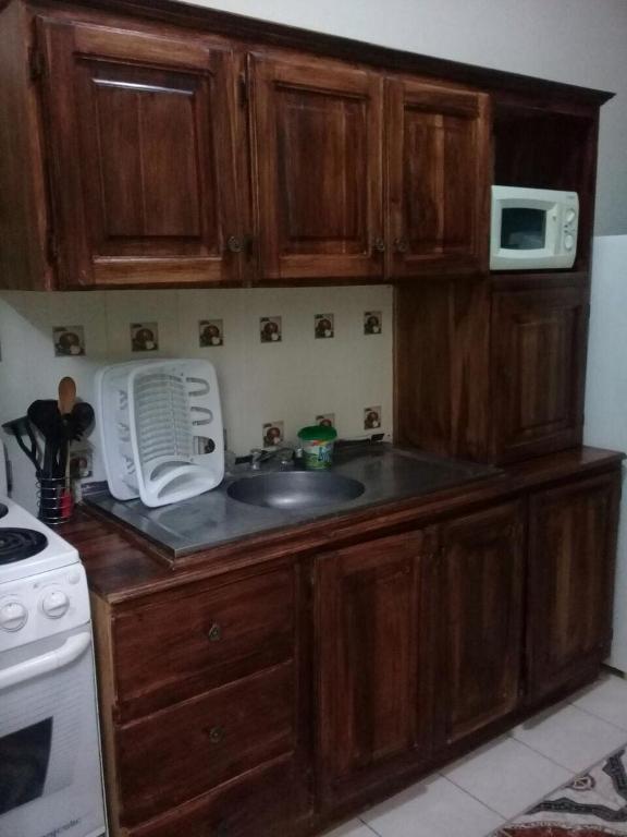 Kuchyň nebo kuchyňský kout v ubytování Apartamentos del Puerto