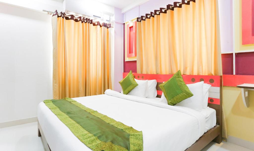 Tempat tidur dalam kamar di Itsy By Treebo - Worldtree Bellandur