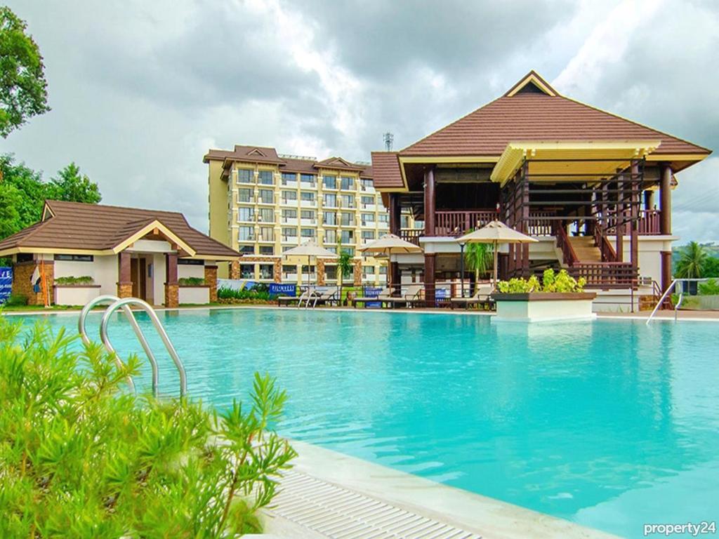 Joi's One Oasis Condo Near Limketkai Mall - Apartment With Balcony
