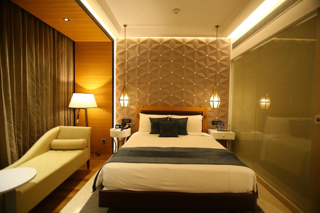 Postel nebo postele na pokoji v ubytování Radisson Blu Coimbatore
