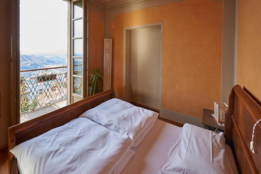 Postel nebo postele na pokoji v ubytování Bellavista Boutique Hotel