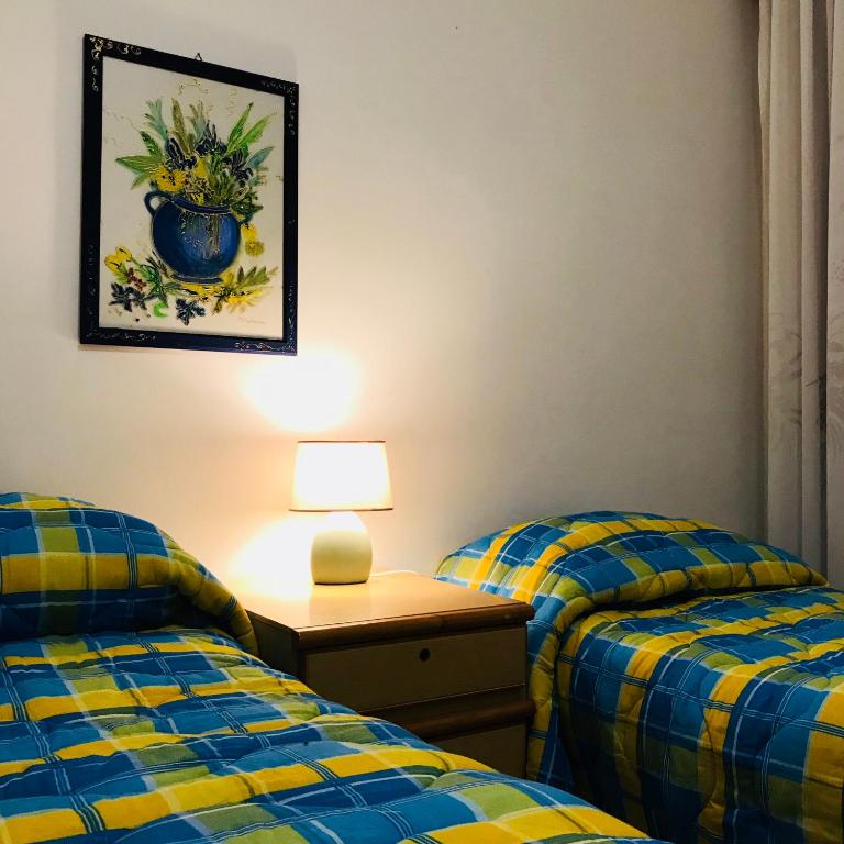 Postel nebo postele na pokoji v ubytování Casa Vacanze Basilicata da Giannino