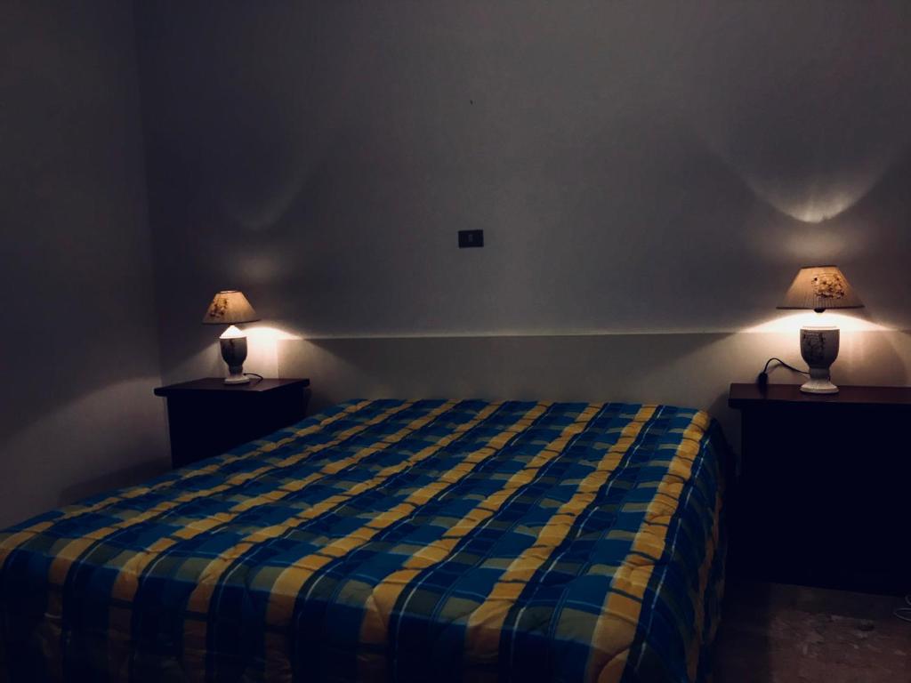 Postel nebo postele na pokoji v ubytování Casa Vacanze Basilicata da Giannino