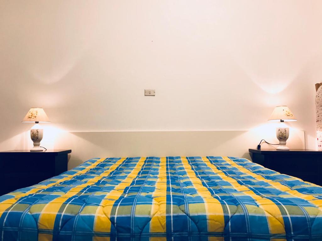 Postel nebo postele na pokoji v ubytování Casa Vacanze Basilicata da Giannino