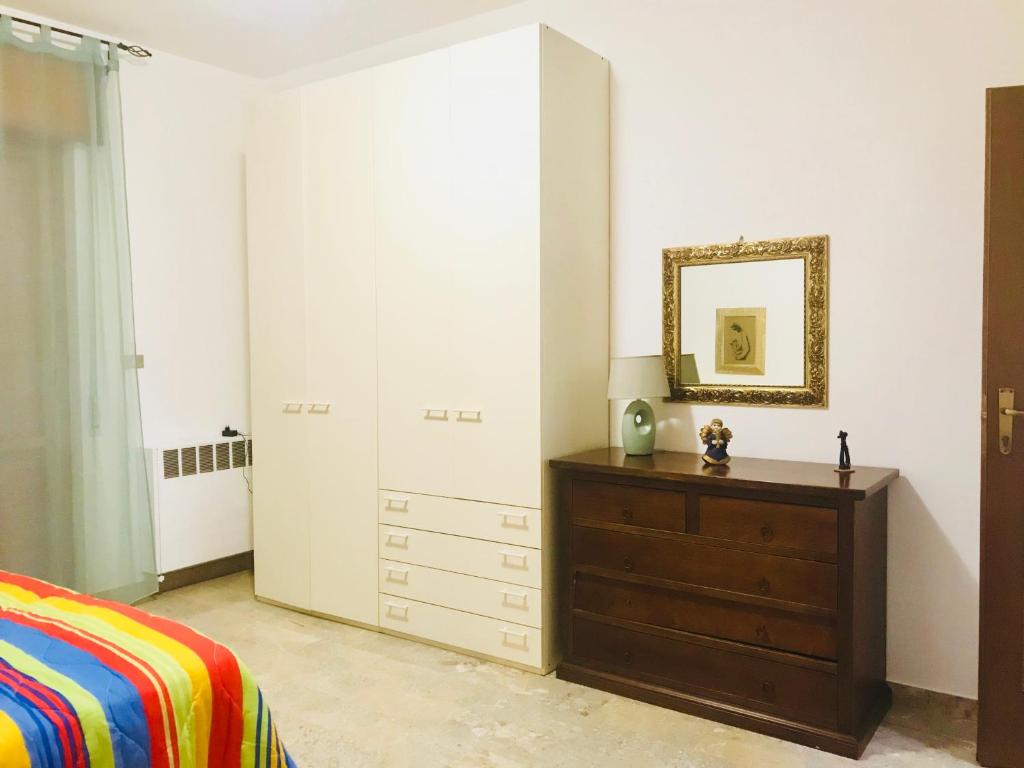 Postel nebo postele na pokoji v ubytování Casa Vacanze Basilicata da Giannino