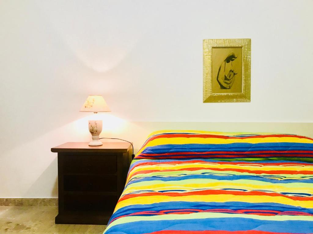 Postel nebo postele na pokoji v ubytování Casa Vacanze Basilicata da Giannino