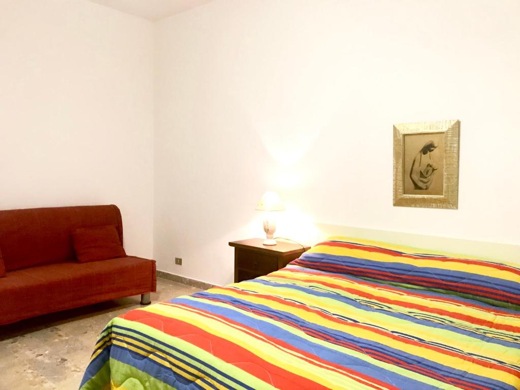 Postel nebo postele na pokoji v ubytování Casa Vacanze Basilicata da Giannino