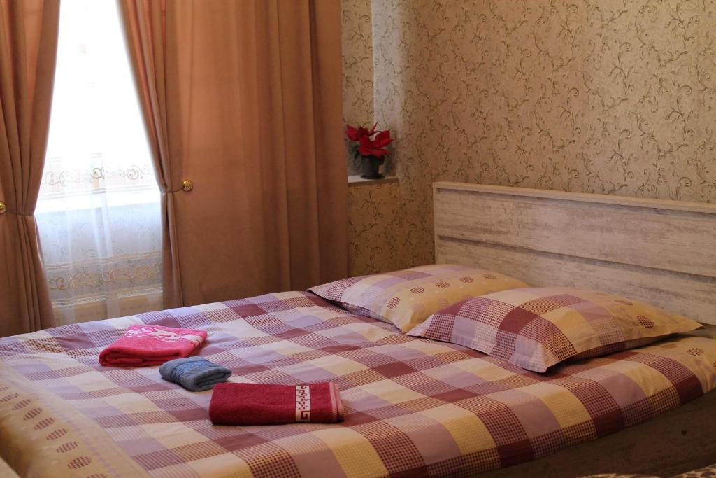 Llit o llits en una habitació de Best Host