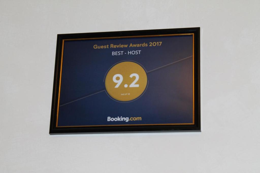 Certificat, premi, rètol o un altre document de Best Host