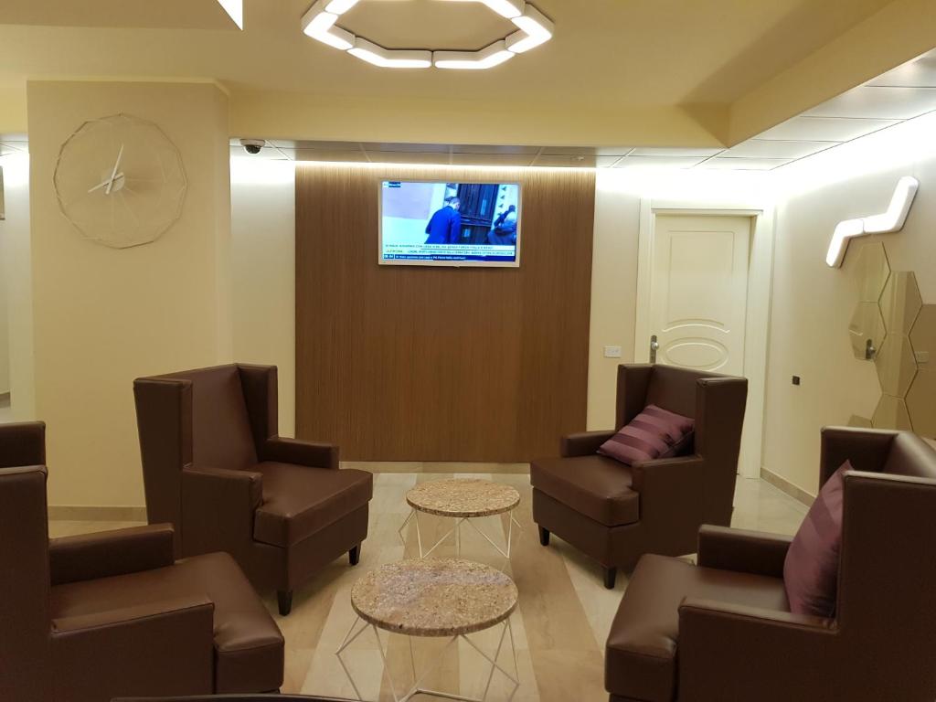 TV a/nebo společenská místnost v ubytování Hotel Motel 2