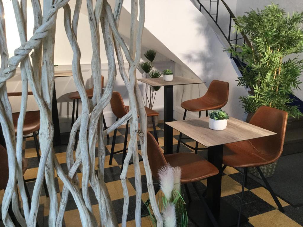 Posezení v ubytování Hôtel Le Mirage