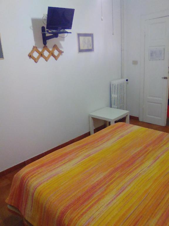 Postel nebo postele na pokoji v ubytování Albergo Cavour SELF CHECK-IN