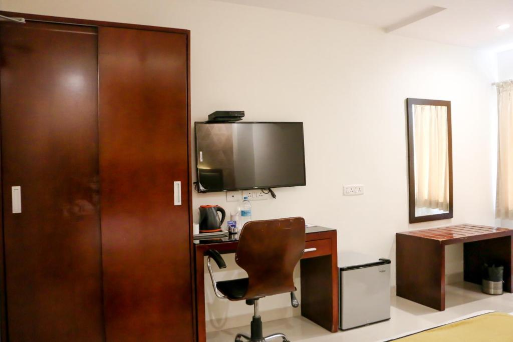 TV a/nebo společenská místnost v ubytování Hotel Winsar Park
