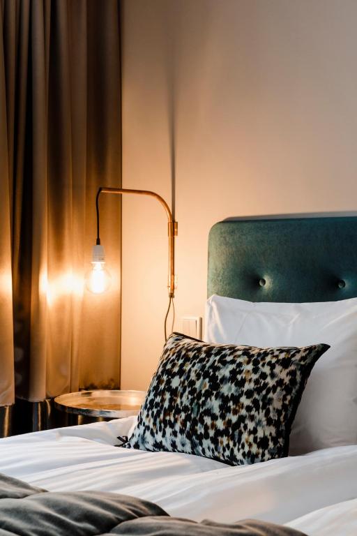 Postel nebo postele na pokoji v ubytování Hotel F6