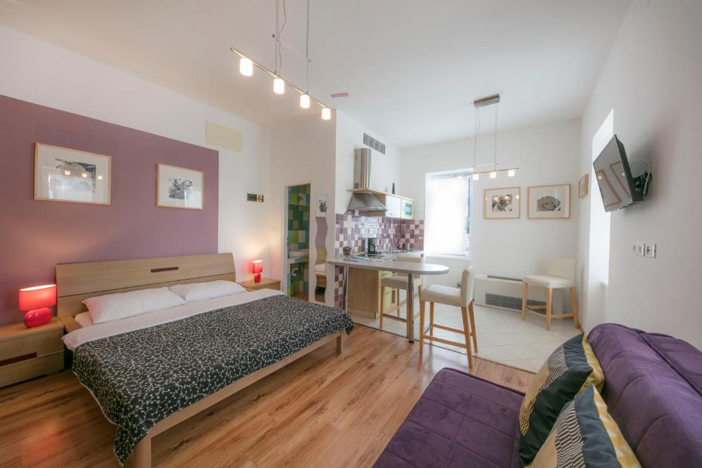Posteľ alebo postele v izbe v ubytovaní Kredo B&B