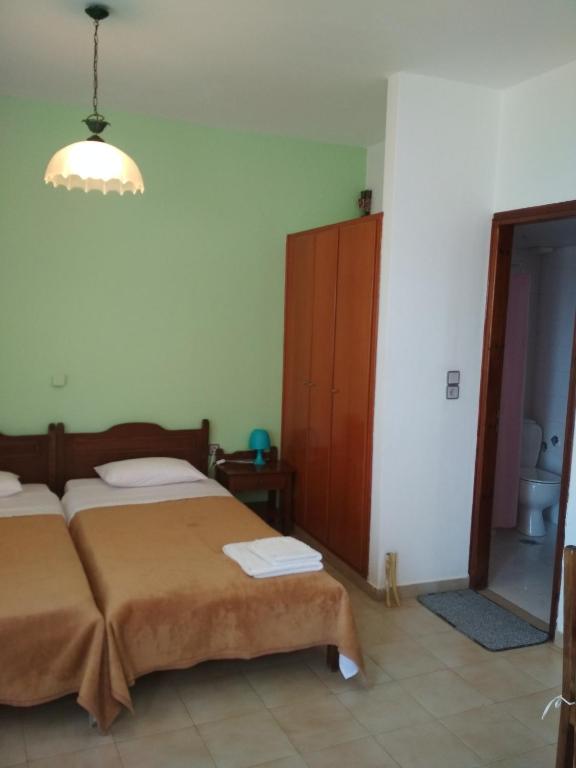 Łóżko lub łóżka w pokoju w obiekcie Flamingo Apartments