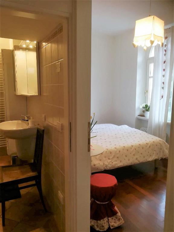 Postel nebo postele na pokoji v ubytování B&B Zenzero e Limone