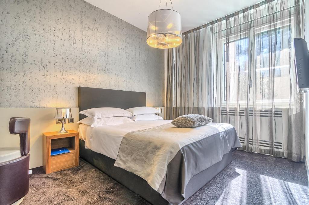 Postel nebo postele na pokoji v ubytování Brijuni Hotel Istra