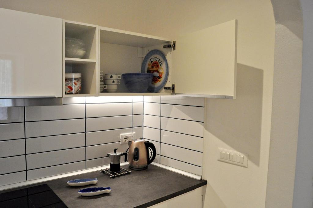 A kitchen or kitchenette at Nibea Suite