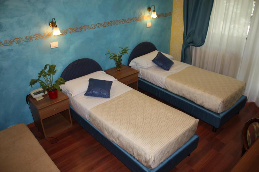 Postel nebo postele na pokoji v ubytování Park Hotel