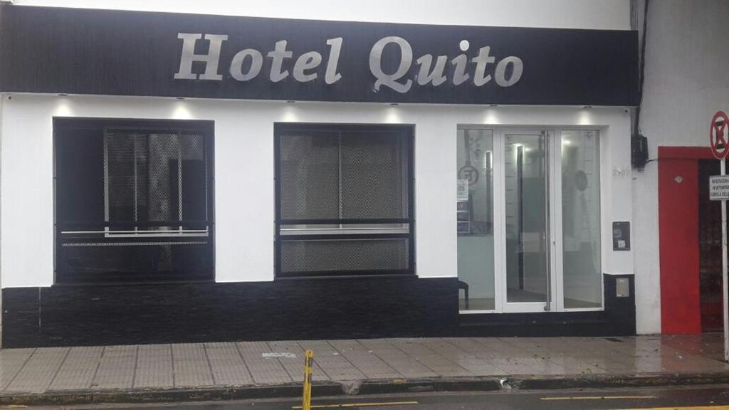 a hotel authority sign on the side of a building at Hotel Quito in Buenos Aires