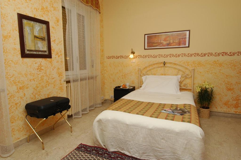 Postel nebo postele na pokoji v ubytování Park Hotel
