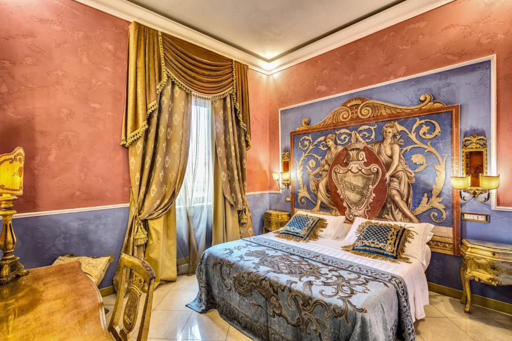 Postel nebo postele na pokoji v ubytování Romanico Palace Luxury Hotel & SPA
