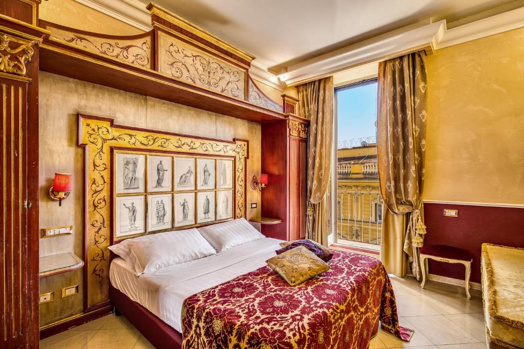 Postel nebo postele na pokoji v ubytování Romanico Palace Luxury Hotel & SPA