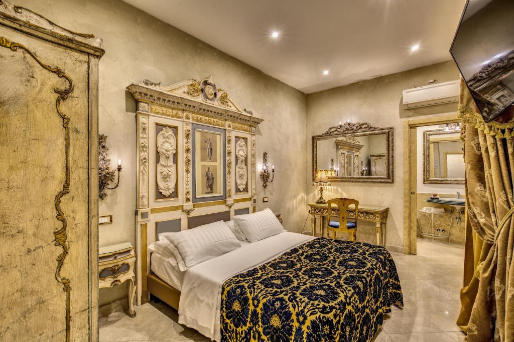 Postel nebo postele na pokoji v ubytování Romanico Palace Luxury Hotel & SPA