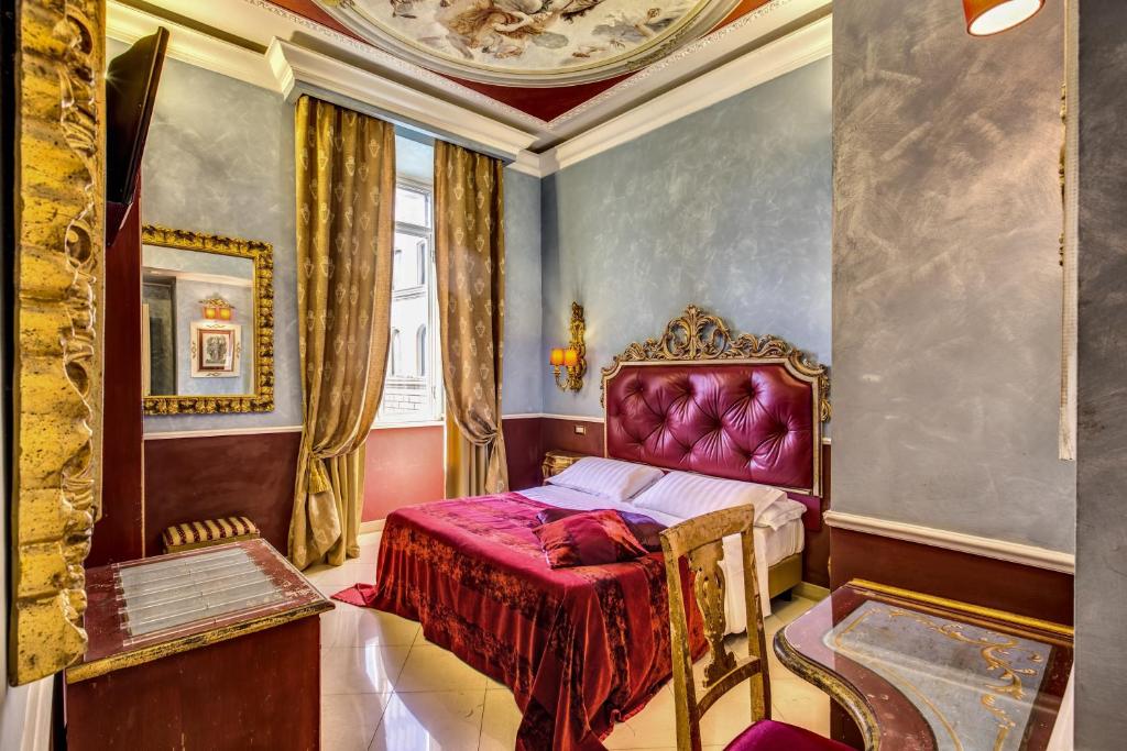 Postel nebo postele na pokoji v ubytování Romanico Palace Luxury Hotel & SPA